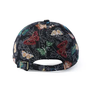Black beret cap with colorful butterfly jacquard pattern and adjustable metal buckle