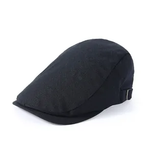 Classic black beret duckbill hat with geometric textured fabric and metal buckle detail