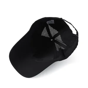 Detail of black quick-dry mesh cap showing 100% nylon material and breathable inner lining
