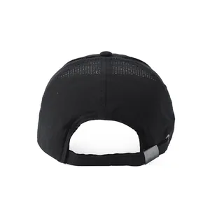 Close-up of black mesh baseball cap showing breathable laser-cut holes and metal buckle