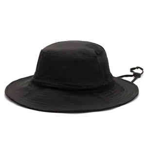 Detail of outdoor sun hat featuring laser-cut ventilation holes and wavy stitching line