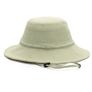 Detail of sage green sun hat with laser-cut ventilation and adjustable chin strap