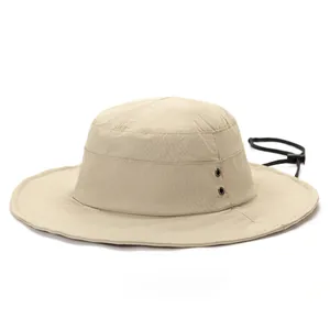 Close-up of quick-dry khaki sun hat with wide brim, ventilation holes and chin strap