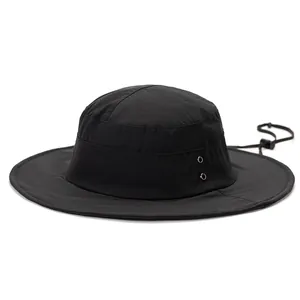 Close-up of black breathable sun hat featuring side metal vents and adjustable chin strap