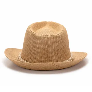 Detail of khaki woven straw fedora hat featuring a stylish decorative rope band