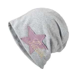 Gray knit beanie featuring a purple star patch and Sizland embroidery in a 45-degree view