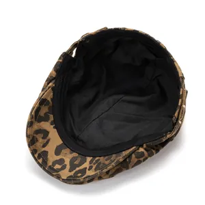 Macro view of leopard print ivy cap showing black inner lining and sweatband detail