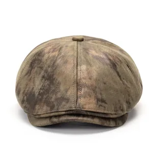 Retro brown distressed newsboy cap with vintage textured fabric and short brim design