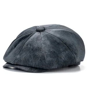 Detailed view of the vintage washed dark grey newsboy cap with 8-panel stitching texture