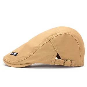 Khaki cotton beret cap with side embroidery and adjustable brass buckle closure