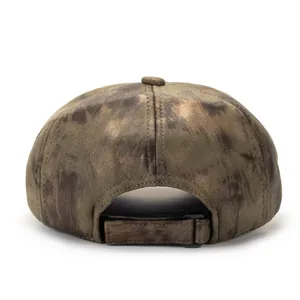 Detail view of the vintage olive green crown and adjustable strap of the street style cap