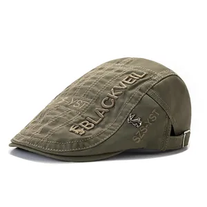 Army green vintage quilted flat cap with Blackveil embroidery and metal badge