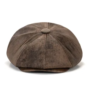 Vintage dark brown distressed leather newsboy cap with classic eight-panel stitching