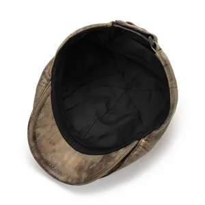 Close-up of the vintage ivy cap interior featuring a soft lining and adjustable buckle