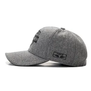 Detailed view of gray wool baseball cap featuring FORCE wing embroidery on the side