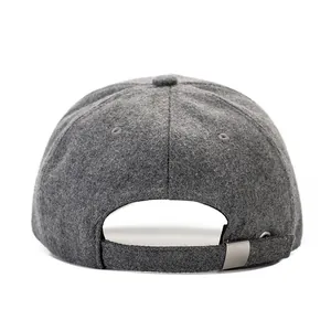 Close-up of winter wool baseball cap back with adjustable silver metal buckle detail