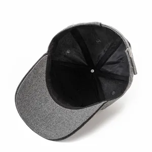 Interior view of winter wool baseball cap showing black lining and reinforced stitching