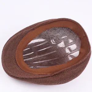 Macro shot of brown breathable mesh flat cap showing interior sweatband and knit texture