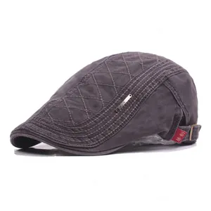 Deep grey vintage flat cap with quilted diamond pattern and adjustable metal buckle
