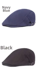 Detail view of navy blue and black wool newsboy caps with side metal buckles