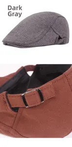 Detail of wool beret showing dark grey fabric and adjustable metal side buckle