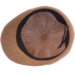 Breathable straw newsboy cap in light brown with adjustable inner drawstring and sweatband
