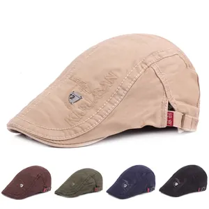 Close-up of cotton twill beret with 3D letter embroidery and adjustable metal buckle