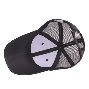 Internal view of a black breathable mesh trucker hat with 100% polyester fabric and snapback
