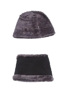 Detailed view of the dark grey knit beanie and thick neck warmer with soft fleece lining