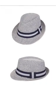 Detailed macro view of the blue and white woven texture on a stylish men's straw jazz hat