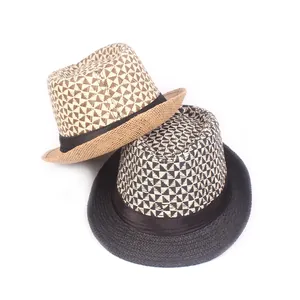 Detail of woven fedora hats with geometric pattern crown and straw texture for summer sun protection