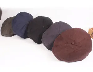 Detailed top view of eight-panel cotton newsboy caps in five classic assorted colors