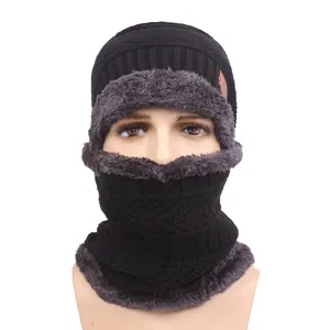 Winter knit beanie and neck warmer set with warm fleece lining and leather patch detail