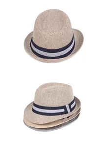 Detailed close-up of woven paper straw fedora hat featuring a striped grosgrain ribbon band