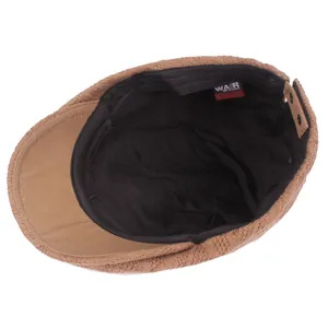 Brown vintage wool newsboy cap for men featuring internal lining and adjustable leather strap