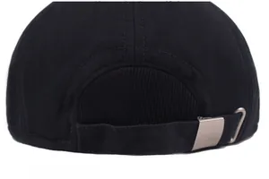 Detail shot of black winter hat with adjustable silver metal buckle and reinforced stitching