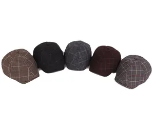 Selection of five plaid newsboy caps in various colors for autumn and winter seasons