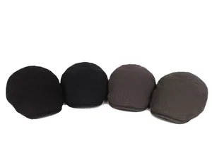 Flat lay of vintage winter newsboy caps in black, brown, grey, and khaki colors