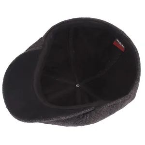 Classic dark grey herringbone octagonal newsboy cap with soft black inner lining