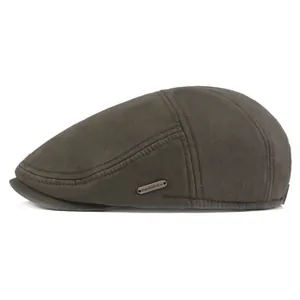 Detailed side view of vintage olive cotton ivy cap with metal logo plate and fine stitching