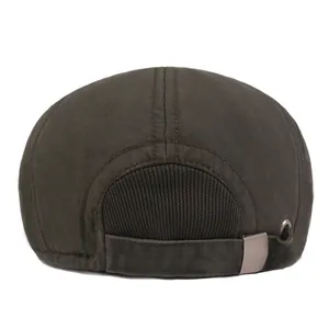 Detail view of the winter cap featuring elastic knit ribbing and adjustable metal buckle