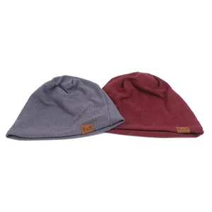 Dark gray and burgundy knit beanies with F&S leather patch in a flat lay view