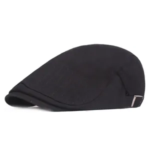 Detail of black cotton ivy cap featuring side decorative stitching and metal adjuster