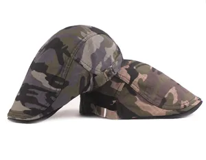 Detail of adjustable metal side buckles on woodland camouflage cotton ivy flat caps