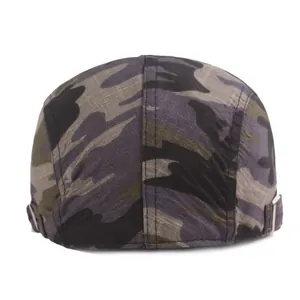 Detail view of cotton camo newsboy cap showing the adjustable metal buckle closure