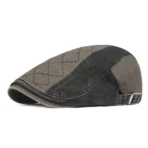 Close-up of vintage cotton beret showing diamond stitching and metal buckle detail