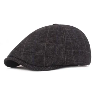 Side profile of a classic grey plaid newsboy cap featuring thick textured wool fabric