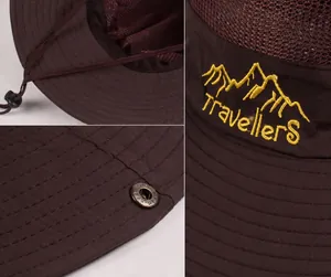 Détails d'un chapeau de soleil avec mesh respirant, broderie de montagne et boucle en métal