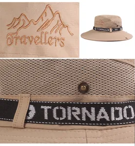 Détail du chapeau bob kaki montrant la broderie Travellers et la maille filet respirante