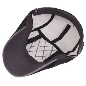 Cotton flat cap interior view showing white quilted lining and black reinforced webbing